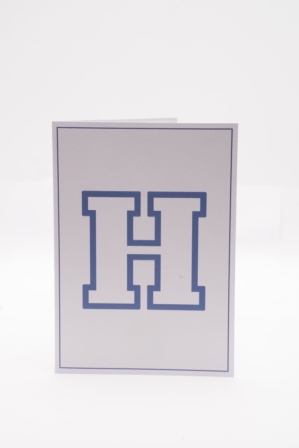 Hampton University card with a blue outlined H on the cover.