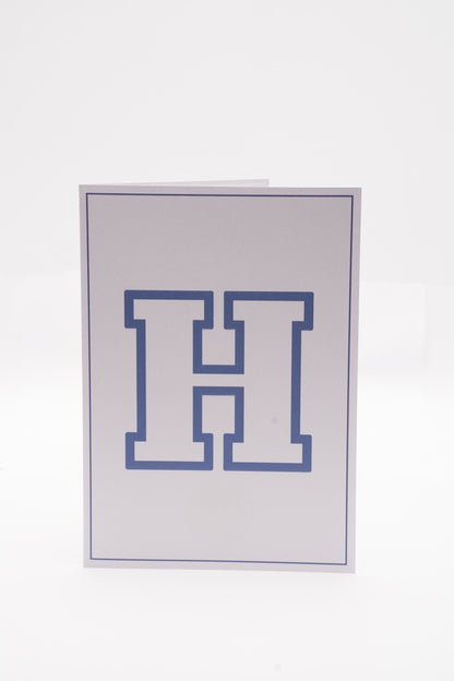 Hampton University card with a blue outlined H on the cover.