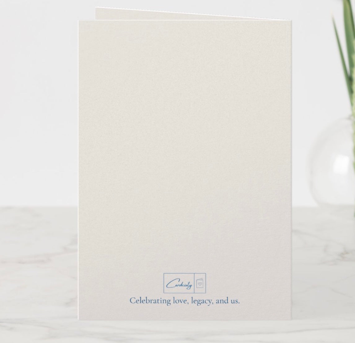 White card with text 'Celebrating love, legacy, and us' on a white background