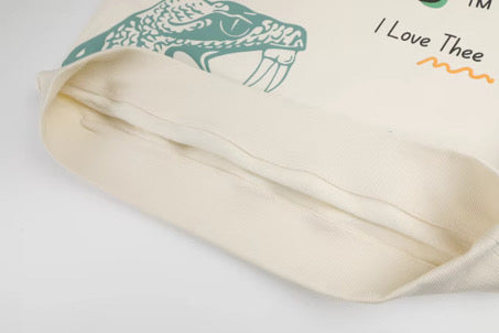 Cushion with famu mascot snake design and text on a white background