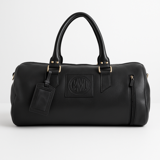 Black leather duffel bag with a brand logo on a white background