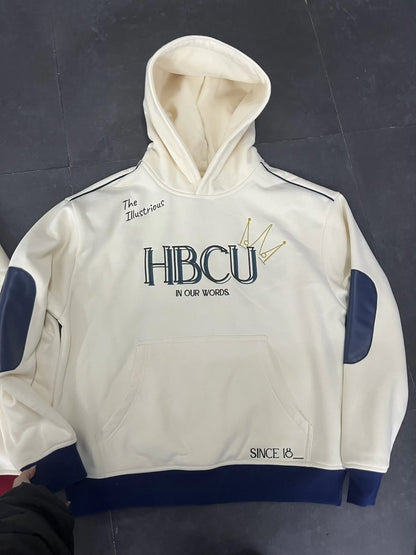 White hoodie with the word 'HBCU' on the front blue accents and text on a dark background